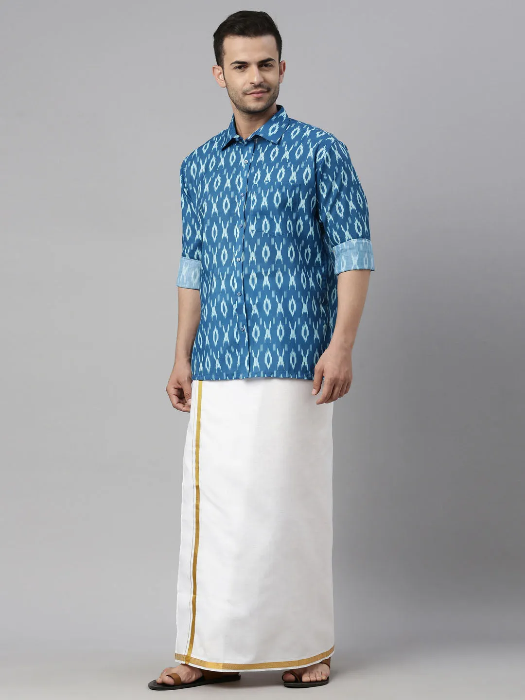 VASTRAMAY Men's Torquoise Blue Ikkat Print Shirt And Mundu Set
